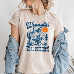 Retro Wranglin&#39; Feral Children Raccoon 90s Western Graphic Shirt, Vintage Western Raccoon Shirt, Women Gift Tee, Feral Children Raccoon Tee