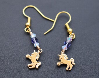Tiny gold unicorn earrings