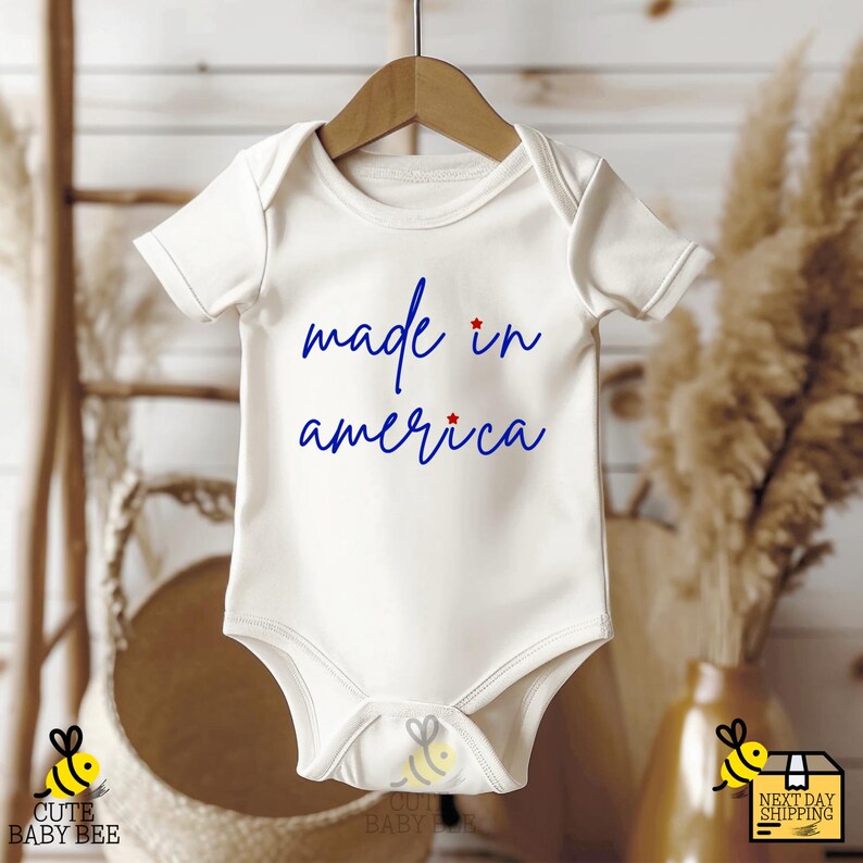 a baby bodysuit that says made in america