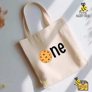 a tote bag with a cookie on it