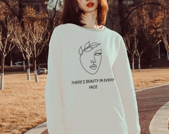 Pullover „There’s Beauty in Every Face“.