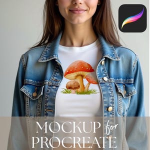 May include: White t-shirt featuring a watercolor illustration of mushrooms with red and brown caps, and green grass. The text "MOCKUP for PROCREATE" is at the bottom. The model is wearing a denim jacket.