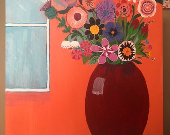 Flowers in a red vase