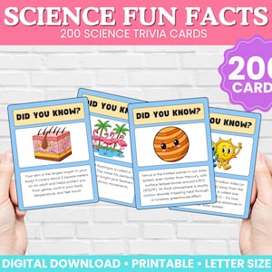May include: Four science trivia cards with the text "Did You Know?" and facts about the human body, flamingos, Venus, and the sun. The cards are held in front of a white brick wall. The text "Science Fun Facts" and "200 Science Trivia Cards" are at the top.