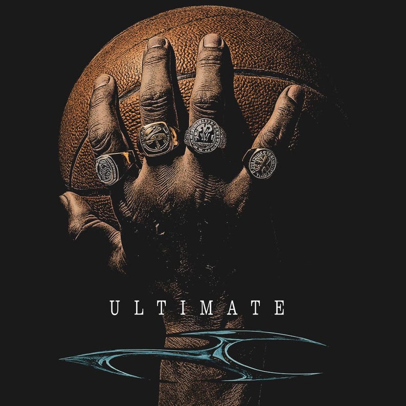 May include: A hand holding a basketball, adorned with multiple rings. The rings are silver and gold, with intricate designs. The word "ULTIMATE" is displayed in white text below the hand, with a blue and silver graphic.