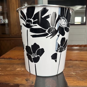 Vintage inspired trash can for a retro style.