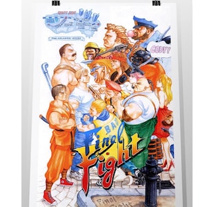May include: A poster featuring the arcade game "Final Fight." The artwork depicts a group of diverse characters in a street scene, with the game's title prominently displayed in a stylized font. The poster is held by two black binder clips.