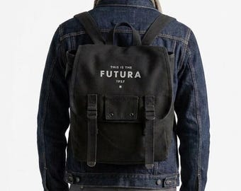 This is the Futura 1927 Canvas Backpack | Modernist Typography Gift for Designers