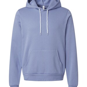 May include: A periwinkle blue hoodie with a drawstring hood and a kangaroo pocket. The long-sleeved sweatshirt has ribbed cuffs and hem. The hoodie is made of a soft, comfortable material.