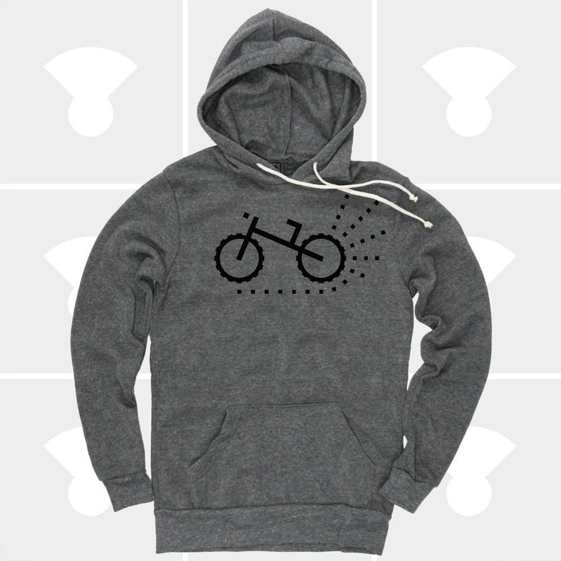 May include: A dark gray hooded sweatshirt with a black bicycle graphic on the front. The bicycle graphic has dotted lines extending from the rear wheel. The sweatshirt has a front pocket and white drawstrings.