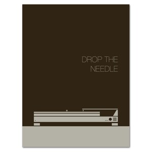 May include: A minimalist poster featuring a turntable illustration in shades of gray and white against a dark brown background. The text "DROP THE NEEDLE" is displayed in a clean, sans-serif font. The design is simple and modern, suitable for music lovers.