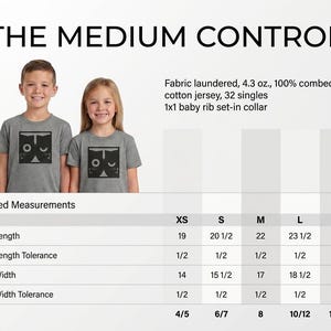 May include: A grey t-shirt featuring a black square graphic of two cat faces. The text reads THE MEDIUM CONTROL. Specifications include 4.3 oz. 100% combed cotton jersey, 32 singles, and 1x1 baby rib set-in collar. A size chart lists measurements in inches.