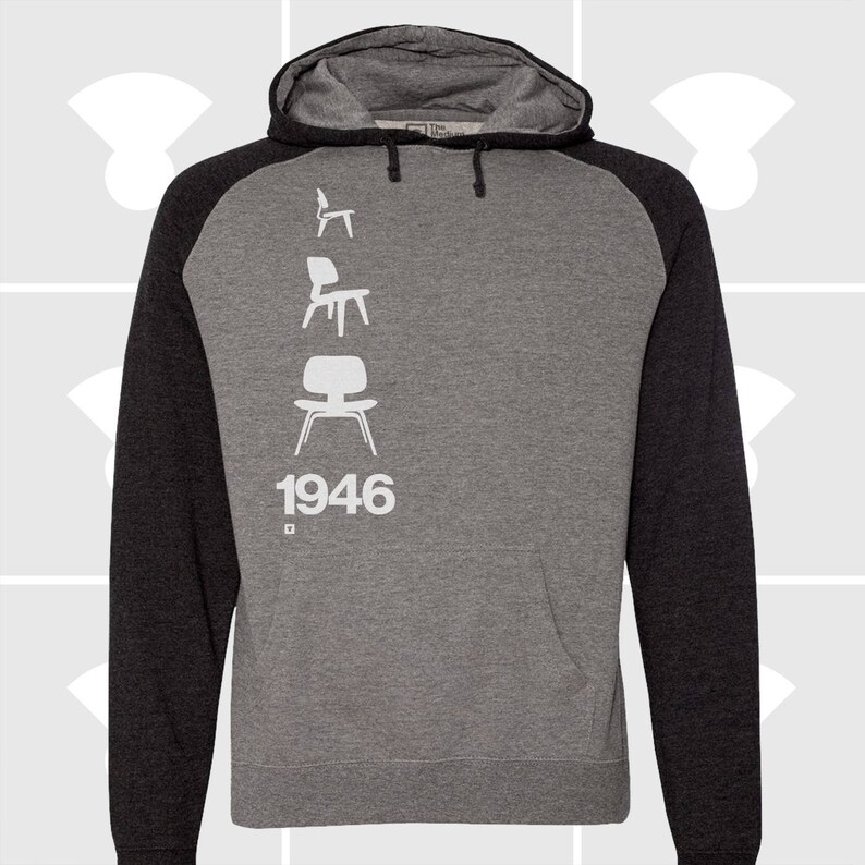 May include: A gray and black hooded sweatshirt with a white silhouette of four chairs and the year 1946 printed on the front.