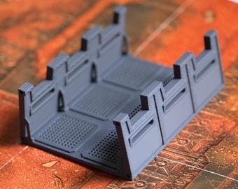 May include: A gray 3D printed model of a modular wall section with a grid pattern on the floor. The wall section is made up of four individual pieces that can be connected together to create a variety of different configurations.