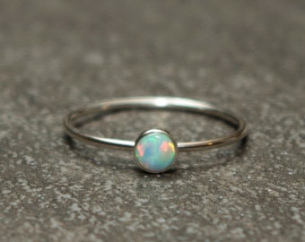 Items similar to Opal Stacking Ring Set of Three on Etsy