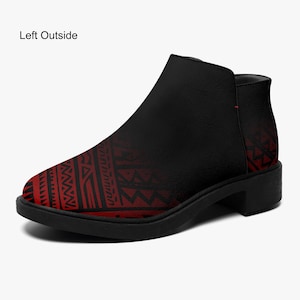 May include: Black ankle boot with a red tribal pattern on the toe and heel. The boot has a low heel and a side opening. The text "Left Outside" is visible on the upper part of the boot.