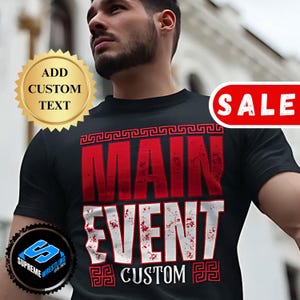 May include: Black t-shirt with a red "MAIN EVENT" graphic and a white "CUSTOM" text. The shirt has a distressed look and features a Greek key design.