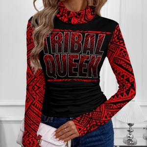 May include: Black long-sleeve shirt with a high neck and the text "TRIBAL QUEEN" in red and white. The sleeves and neckline feature a red tribal pattern. The shirt is form-fitting.