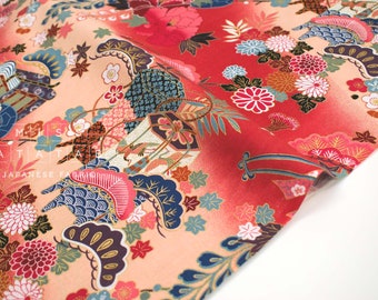 May include: Japanese fabric with a vibrant floral and geometric pattern. The fabric features red, peach, blue, and gold colors. The text "MATATA JAPANESE FABRIC" is visible on the fabric.