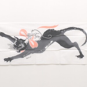May include: A black cat with a pink bow runs with a smaller white cat on its back. The image is printed on a white fabric.
