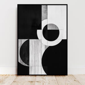 Peut inclure: Impression d'art géométrique abstraite en noir et blanc avec des cercles et des carrés qui se chevauchent.