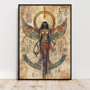 May include: A digital art print of an Egyptian goddess with wings, standing in a circle of hieroglyphs. The goddess is depicted with dark skin, long black hair, and a golden crown. She is holding a staff in one hand and a symbol in the other.