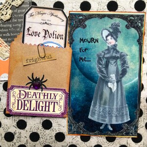 May include: A vintage-style card with a black and white illustration of a woman in a long dress and a hat. The text on the card reads "Mourn For Me..." The card is framed with a decorative border.