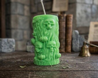 Handcrafted cylinder-shaped candle with skeletons, pumpkins, and bats; Spooky Halloween decoration; Autumnal scent; Handmade dark decor