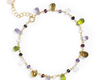 Multi-gemstone bracelet with. Garnet, Peridot, Moonstone, Amethyst, Pearl, Spinel. Single Strand