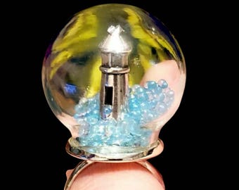 Lighthouse Globe Ring: Moving Blue Waves, Silver Plated, Adjustable