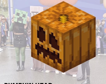 May include: A large, pixelated pumpkin head costume with a carved face, in shades of orange and brown. The text "PUMPKIN HEAD" is displayed in bold, black letters at the bottom of the image. People are in the background.