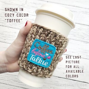 May include: A knitted coffee cup sleeve in a cozy toffee color, with a blue square patch embroidered with "Coffee before Talkie" and hearts. The sleeve is wrapped around a white paper coffee cup. Additional text indicates other colors are available.