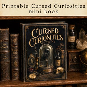 May include: A mini-book titled "Cursed Curiosities" with a black cover and gold lettering. The cover features a glass dome with a raven inside, a skull, and a pocket watch. Other books and potion bottles are visible on a wooden shelf.