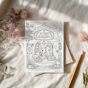 May include: A black and white coloring page featuring a squirrel wearing a chef hat inside an acorn-shaped bakery. The text reads ACORN BAKERY and Baked with Love from the Forest. The illustration includes shelves, baked goods, and flowers.
