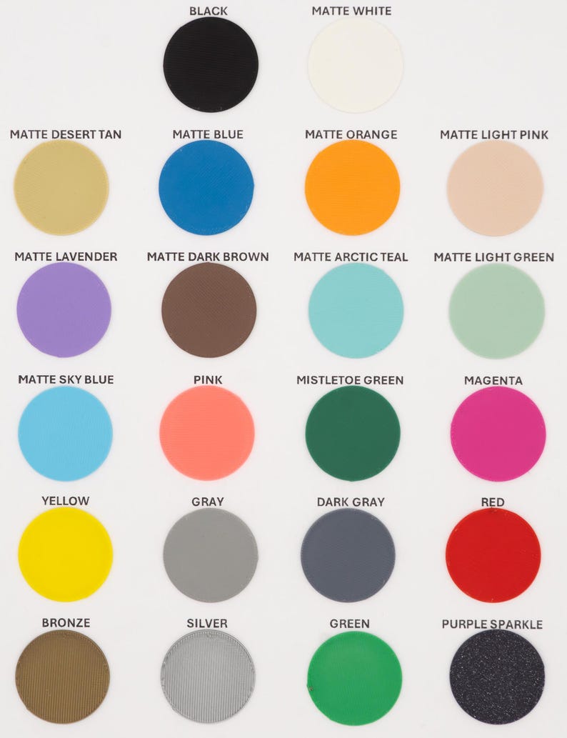 May include: A color chart featuring 24 matte finish circles in various colors. Colors include black, white, tan, blue, orange, pink, lavender, brown, teal, green, sky blue, pink, mistletoe green, magenta, yellow, gray, dark gray, red, bronze, silver, green, and purple sparkle.