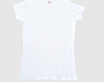 May include: A white t-shirt with a crew neck and short sleeves. The shirt has a small red tag on the front with the text "Fruit of the Loom" on it.