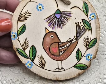 Sweet little Wood Burned Bird Ornament on a natural wooden slab. Nursery Art Woodland Cottagecore Garden theme