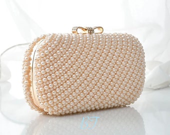 Roségouden clutch met parels