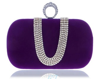 Elegante, mehrfarbige Clutch mit Samt-Finish.