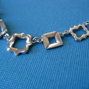 Five Tiny Frames Necklace. Sterling Silver. image 1