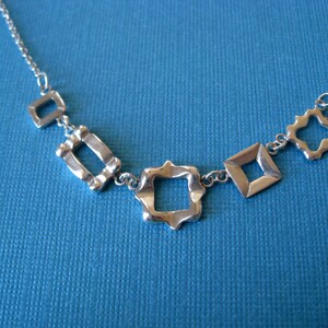 Five Tiny Frames Necklace. Sterling Silver. image 2