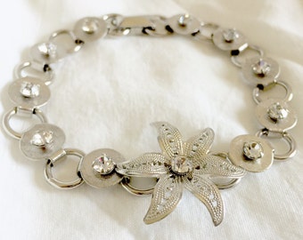 Vintage Art Deco Silver Tone Filigree Lily Flower Round Brushed Round Disk Clear Rhinestone Link Bracelet