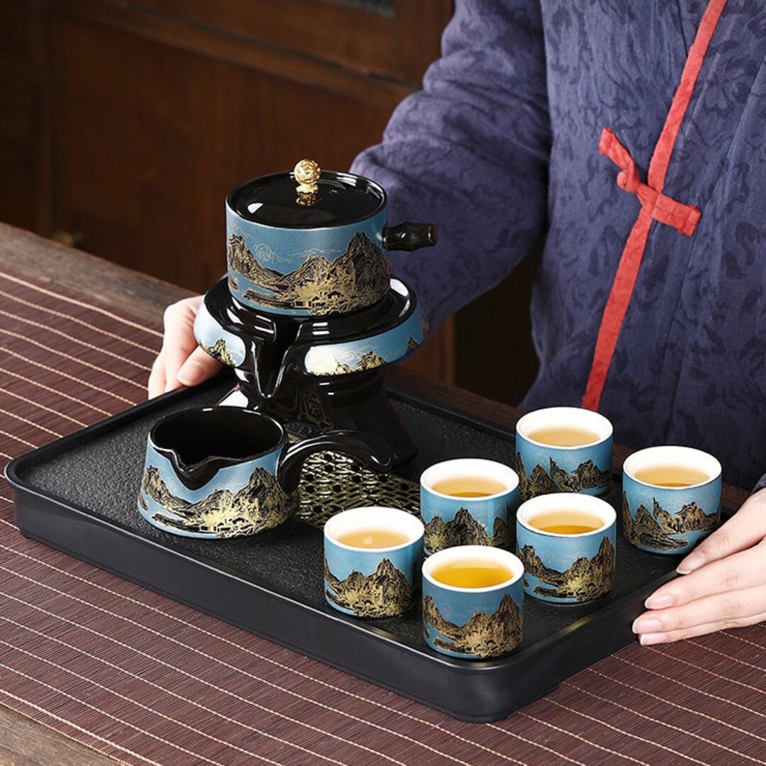 Ceramic Automatic Tea Set Kung Fu Tea Set Creative Stone Mill Rotating ...