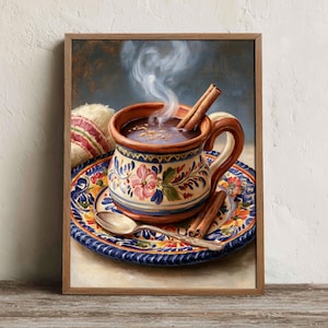 May include: A ceramic mug filled with a dark steaming beverage and cinnamon sticks sits on a matching floral patterned saucer. A silver spoon rests on the plate next to the mug, which features hand-painted pink flowers and blue accents.