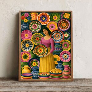 May include: A framed painting depicting a person in a purple top and yellow skirt surrounded by numerous colorful, patterned ceramic plates and vases. The artwork features vibrant floral motifs and geometric designs in shades of pink, blue, green, and orange, arranged in a dense, decorative composition.