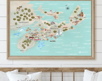 May include: A framed art print of a map of Nova Scotia, Canada, featuring illustrations of landmarks, wildlife, and nautical elements. The map is set against a light blue background, with a wooden frame. The words "Atlantic Ocean" are visible.