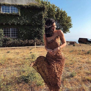 Robe mode femme dos nu imprimé léopard image 1