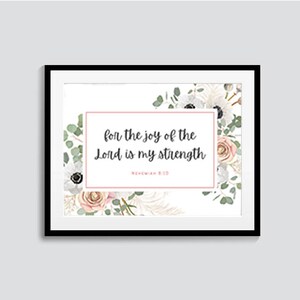 Puede incluir: Una impresión enmarcada en blanco con un diseño floral y el texto "for the joy of the Lord is my strength" con la referencia bíblica "Nehemías 8:10".