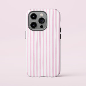 May include: A pink and white striped phone case for an iPhone 14 Pro Max.