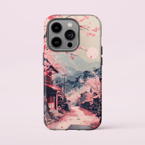 May include: A phone case with a colorful illustration of a Japanese village with cherry blossoms and a mountain in the background.